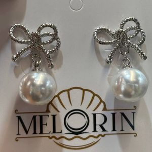 گوشواره زنانه پاپیون مدل مرواریدی اویز دار