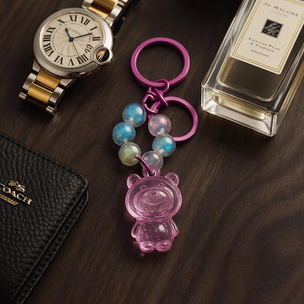 جا کلیدی و اویز کیف مدل کیتی از جنس پلاستیک فشرده