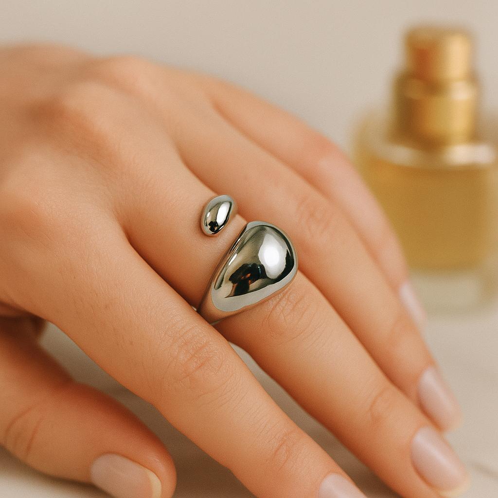 قیمت انگشتر زنانه فانتزی طرح قطره اب از جنس استیل