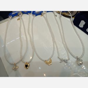 فروش اینترنتی گردنبند مروارید پلاک دار