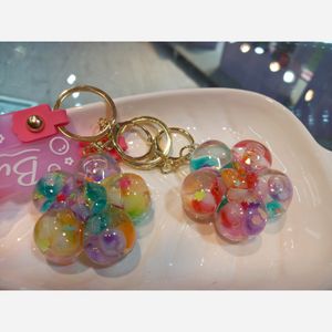 خرید اینترنتی جاکلیدی اکواریومی طرح گل