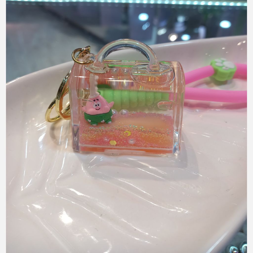 قیمت جاکلیدی اکواریومی کیف دستی