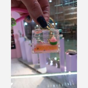 قیمت جاکلیدی اکواریومی کیف دستی