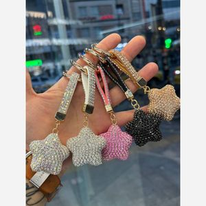 خرید انلاین جاکلیدی فول نگین ستاره ای 