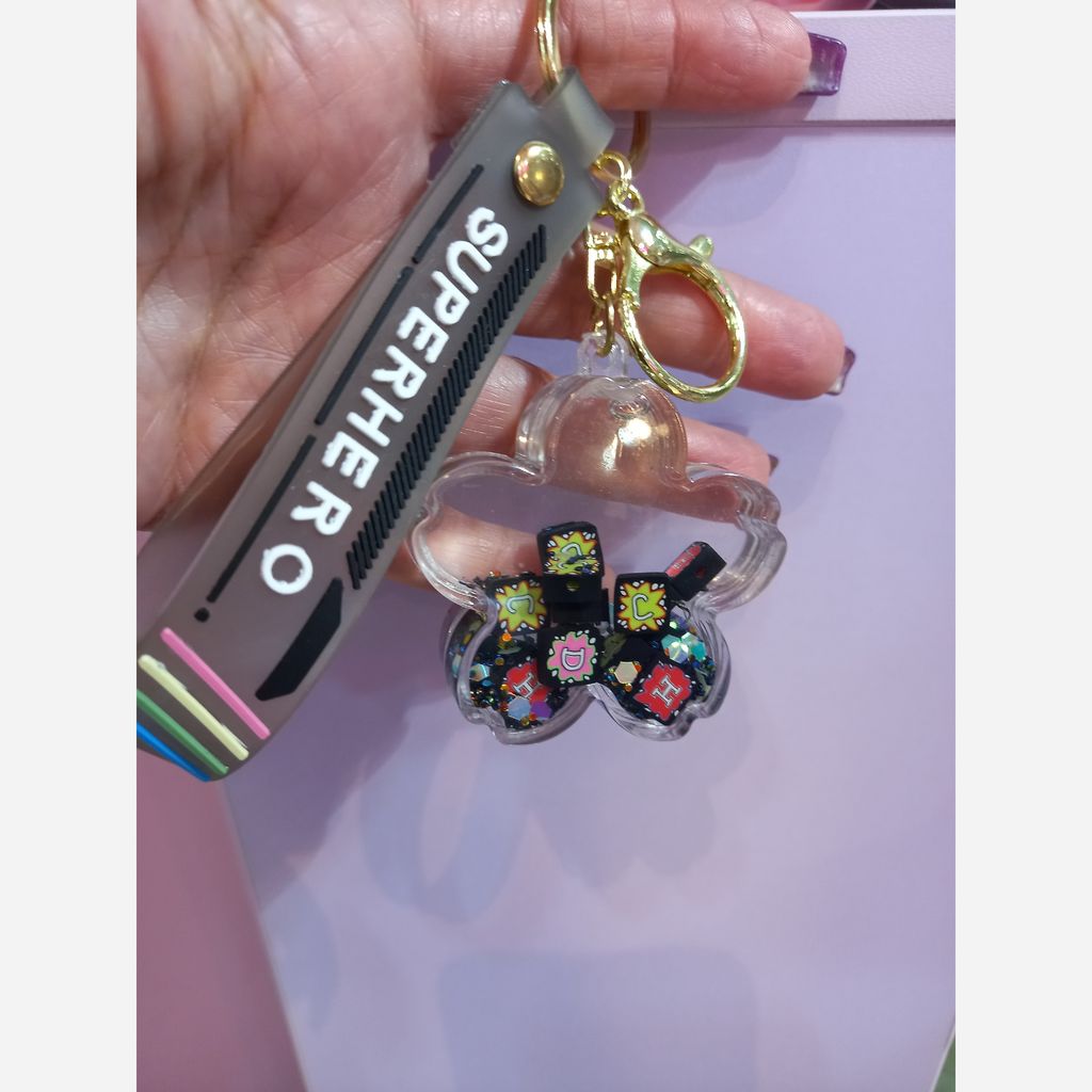 خرید آنلاین جاکلیدی اکواریومی طرح گل و حروف