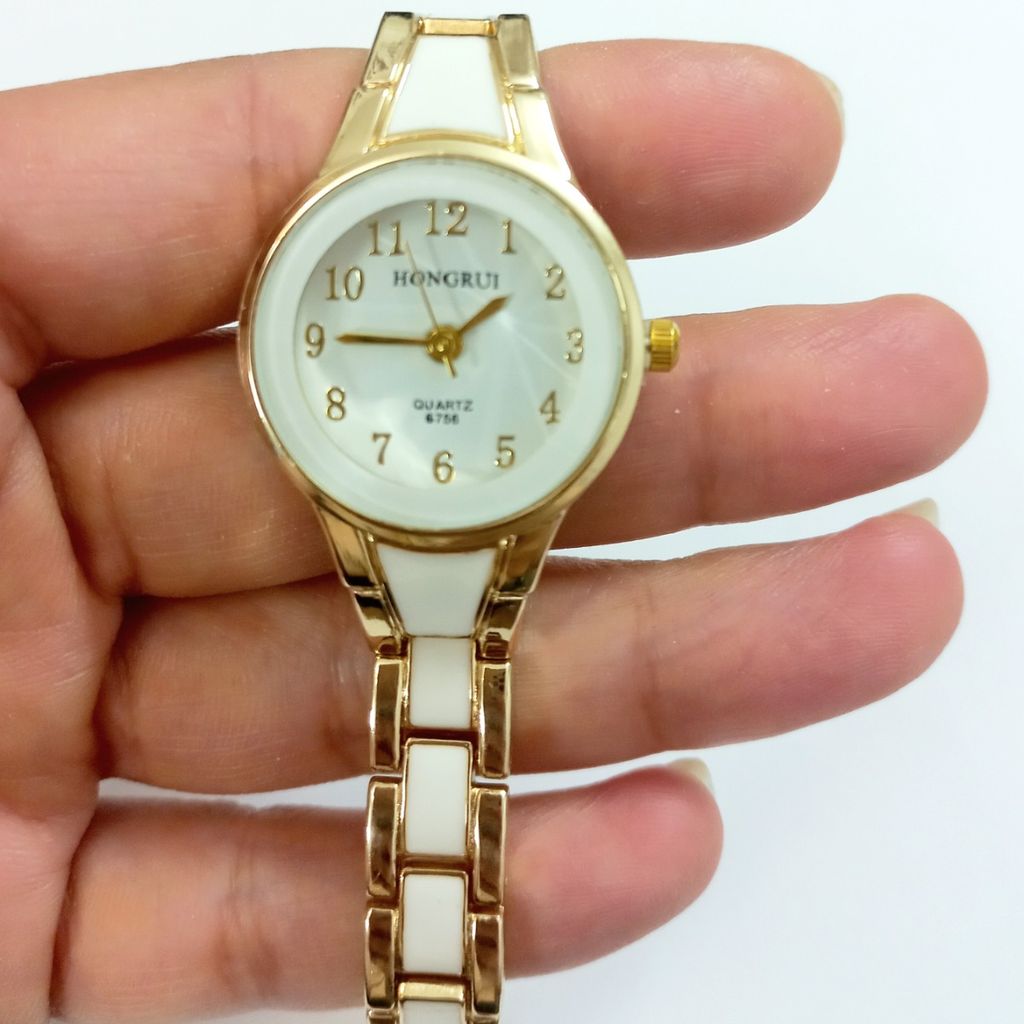 مشخصات ساعت صدفی طلایی