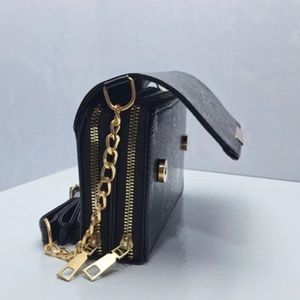 فروش اینترنتی کیف مجلسی زنانه رودوشی طرح پوست ماری