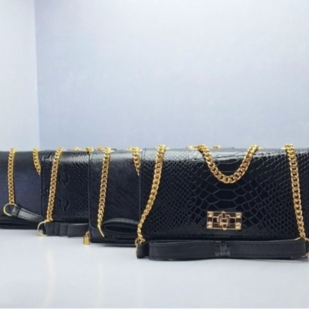 خرید انلاین کیف مجلسی زنانه طرح رعد و برق