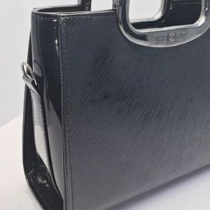 خرید اینترنتی کیف زنانه شیک مدل پرستو طرح رگباری