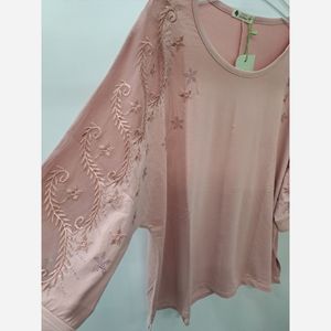 خرید انلاین بلوز زنانه استین کار شده 