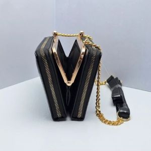 فروش اینترنتی کیف زنانه مجلسی مدل آهو طرح موجی