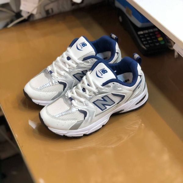 کفش نیوبالانس 530 زنانه رنگ سفید سورمه ای