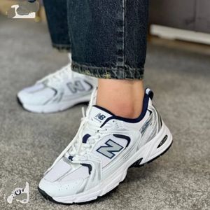 کفش نیوبالانس 530 زنانه رنگ سفید سورمه ای