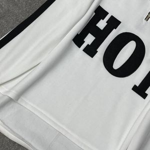 خرید اینترنتی هودی کلاه دار طرح نیم زیپ HOT