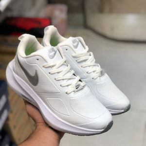 خرید اینترنتی کفش نایک گاید مردانه چرم زیره اصلی سفید