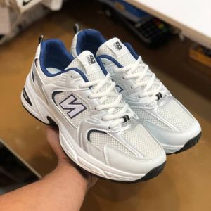 خرید انلاین کفش نیوبالانس 530 مردانه خارجی رنگ سفید سورمه ای