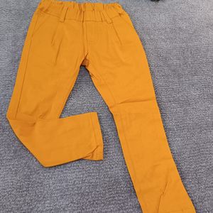 شلوار اسپرت کتان بچه گانه خردلی وارداتی