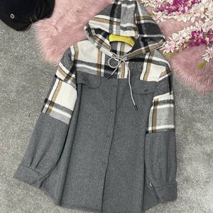 خرید اینترنتی پالتو زنانه طرح ترکیبی