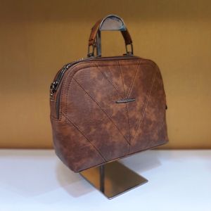 مشخصات کیف زنانه صدفی دوزیپ