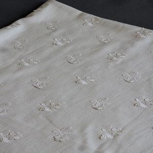 خرید اینترنتی قیمت پارچه شنل گل برجسته