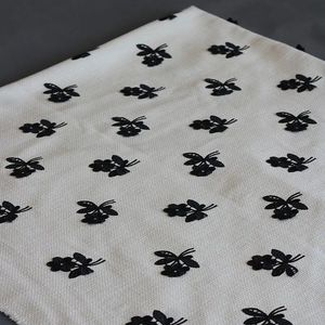 خرید اینترنتی قیمت پارچه شنل گل برجسته