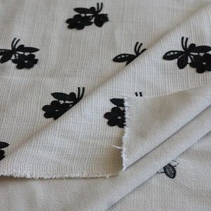 خرید اینترنتی قیمت پارچه شنل گل برجسته