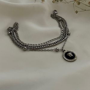 خرید اینترنتی دستبند چند لاین ورساچ