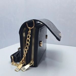 قیمت کیف مجلسی زنانه مدل شقایق طرح پوست ماری