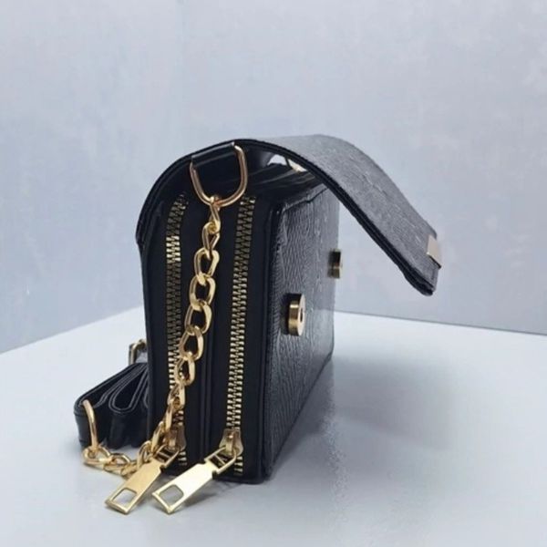 کیف مجلسی زنانه مدل شقایق طرح پوست ماری