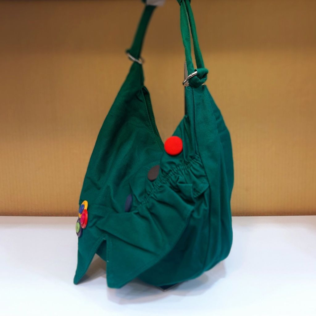 خرید آنلاین کیف اسپرت دکمه‌ای سبز