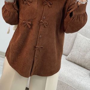 خرید اینترنتی مانتو کبریتی پاپیون