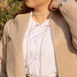 خرید آنلاین پالتو زنانه کوتاه موهری کرم