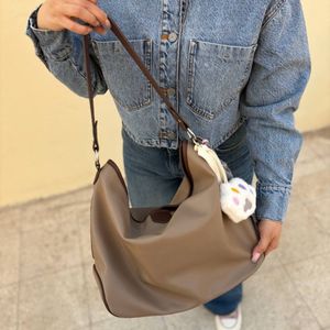 قیمت ارزان کیف دوشی زنانه و دخترانه جادار مدل آرکانان