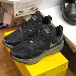 فروش اینترنتی کفش نایک گاید مردانه سری رانر رنگ مشکی طوسی