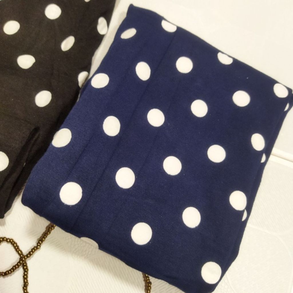 خرید آنلاین شلوار یا لگ خالخالی زنانه