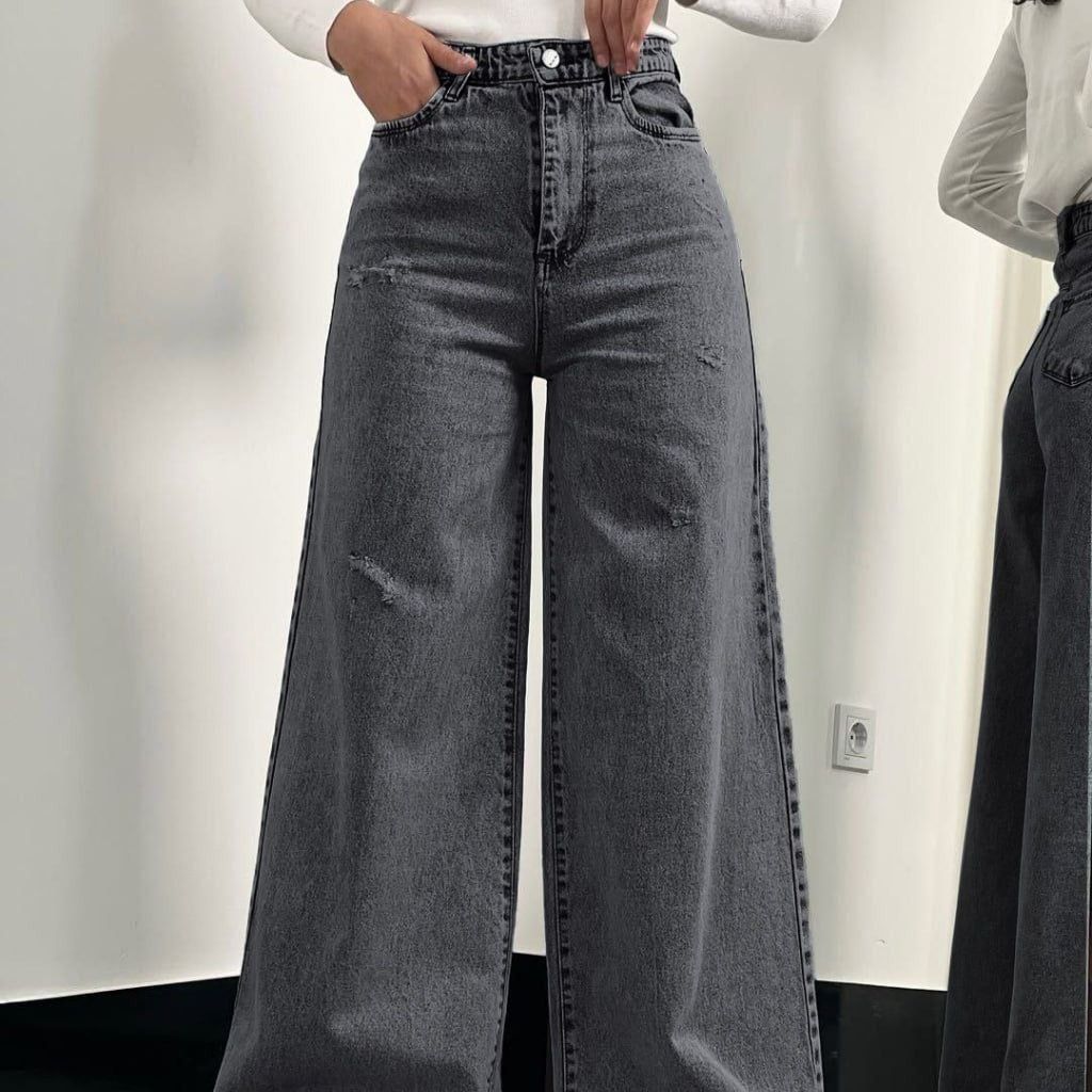 خرید اینترنتی شلوار بگ جین  لی کج راه سنگ شور شده