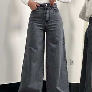 خرید اینترنتی شلوار بگ جین  لی کج راه سنگ شور شده