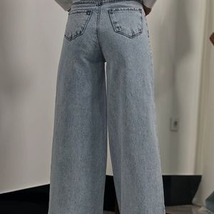 مشخصات شلوار بگ جین  لی کج راه سنگ شور شده