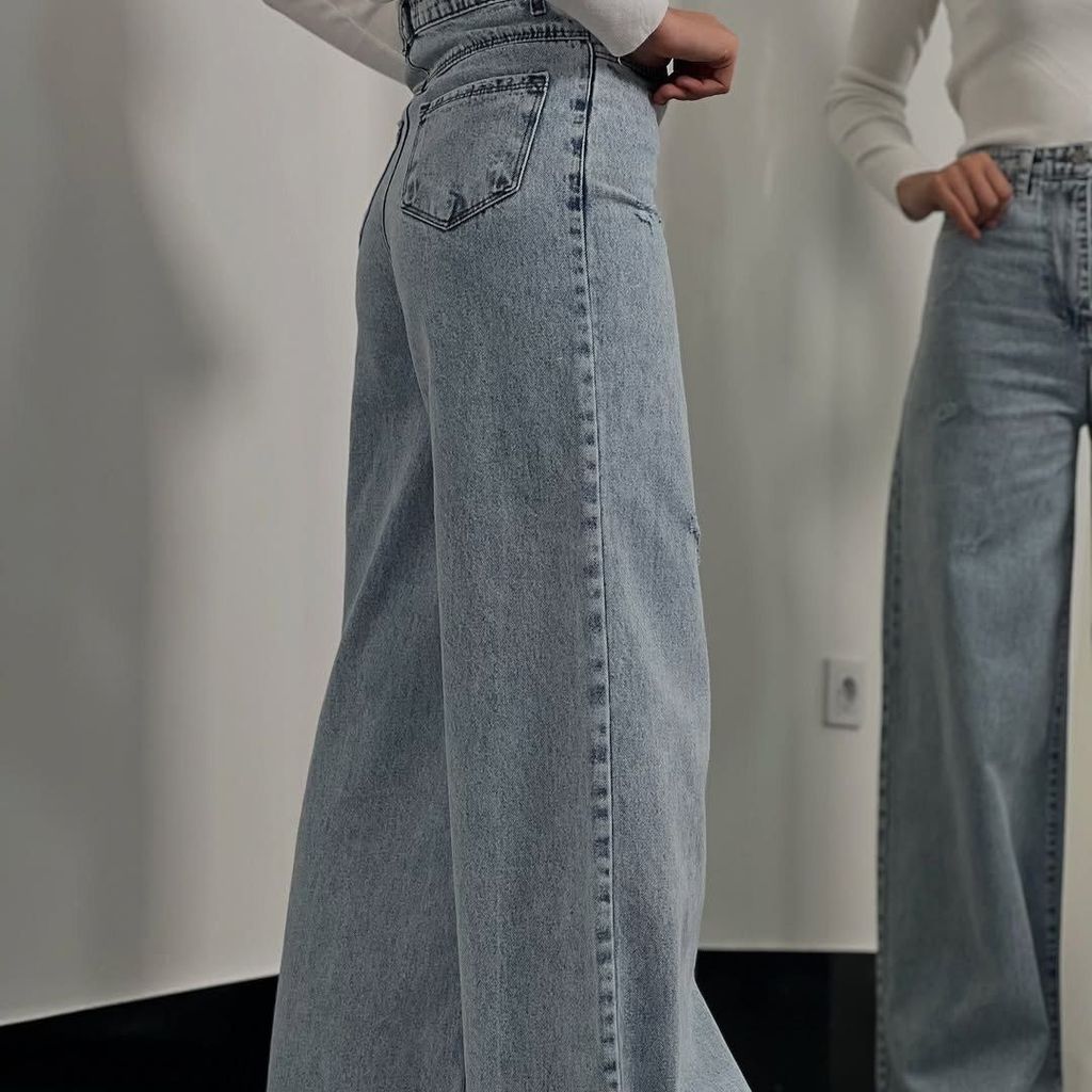 خرید اینترنتی شلوار بگ جین  لی کج راه سنگ شور شده