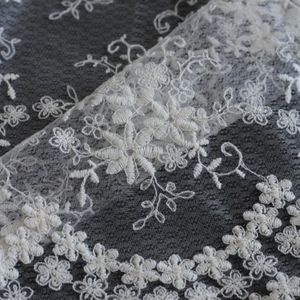 خرید اینترنتی پارچه های تور طرحدار