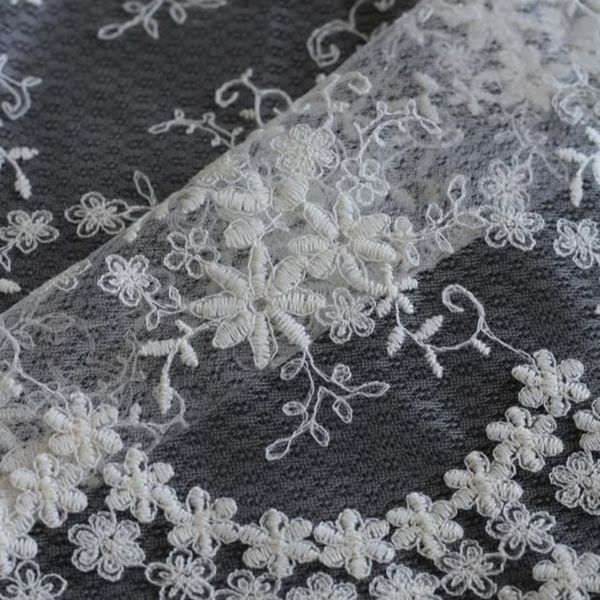 پارچه های تور طرحدار