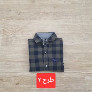 فروش اینترنتی پیراهن پسرانه چهارخانه نخ پنبه‌ای | استایل شیک، راحتی بی‌نظیر، رنگبندی