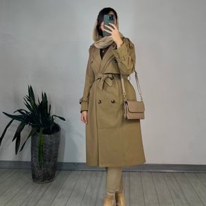 فروش اینترنتی مانتو بارونی چشمک نورا