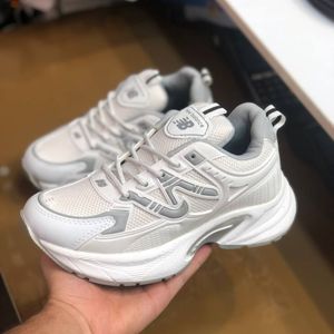 مشخصات کفش نیوبالانس 770زنانه رنگ سفید طوسی