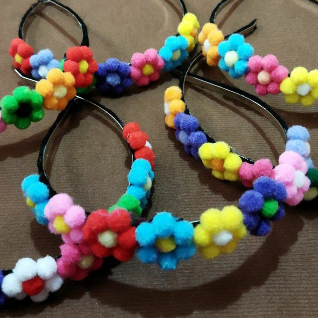 خرید اینترنتی تل پوم پوم گل