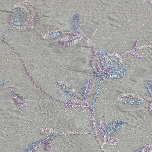 قواره پارچه حریر لیمویی پفکی گل دار خامه دوزی شده صورتی بنفش آبی اکلیل دار