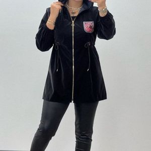 خرید اینترنتی کاپشن زنانه استیکری