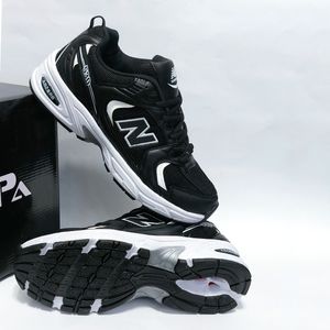 خرید اینترنتی کتونی پرطرفدار نیوبالانس 530 مشکی سفید New balance