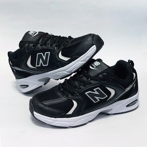 خرید اینترنتی کتونی پرطرفدار نیوبالانس 530 مشکی سفید New balance