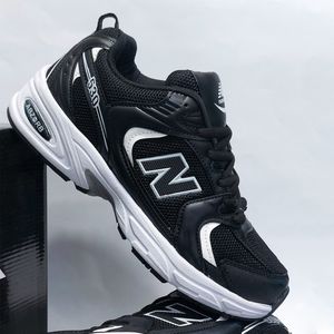خرید اینترنتی کتونی پرطرفدار نیوبالانس 530 مشکی سفید New balance